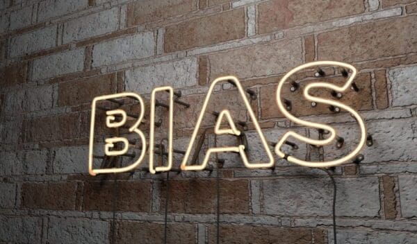 BIAS - Glowing Neon Sign on stonework wall