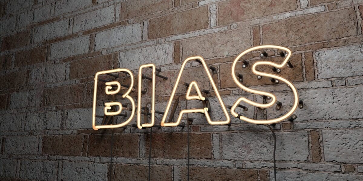 BIAS - Glowing Neon Sign on stonework wall