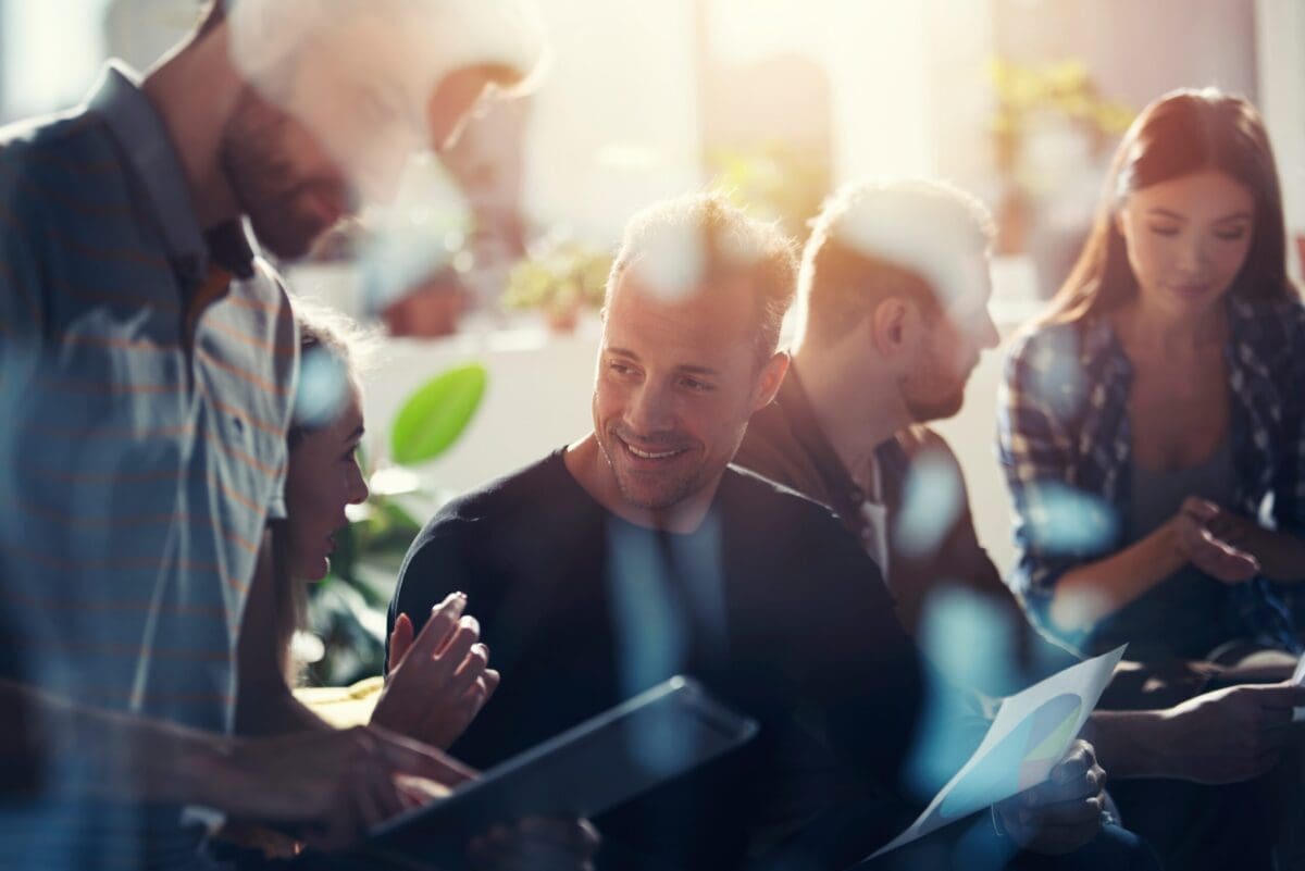 Business people in office connected on internet network with a tablet. concept of startup company. double exposure