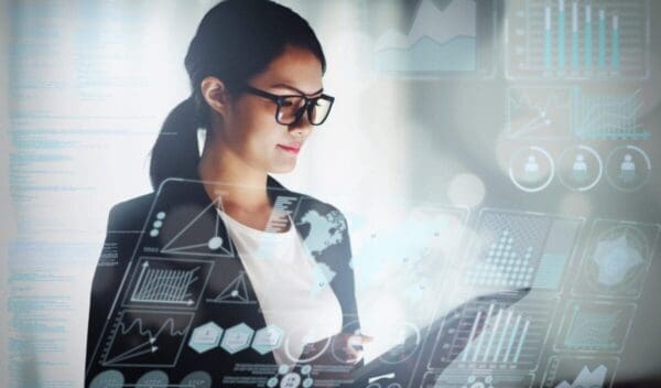young business woman working in office with tablet