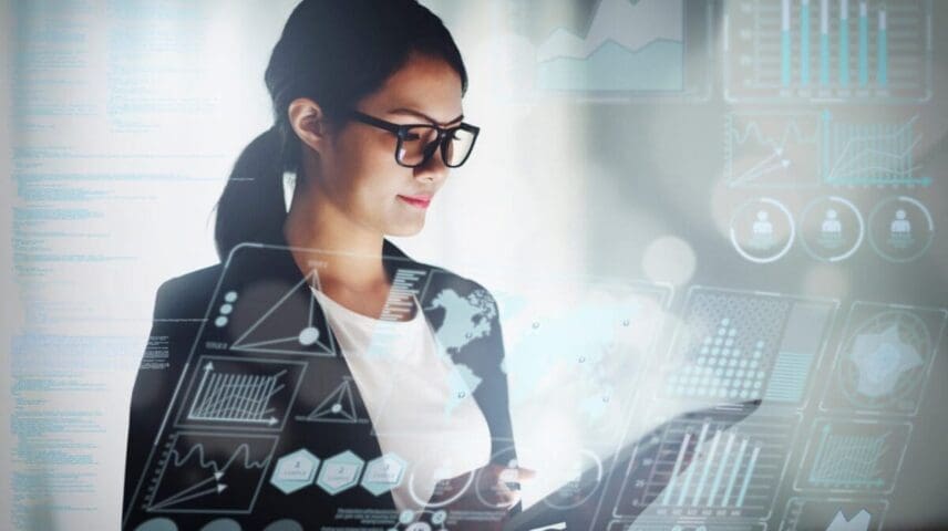 young business woman working in office with tablet