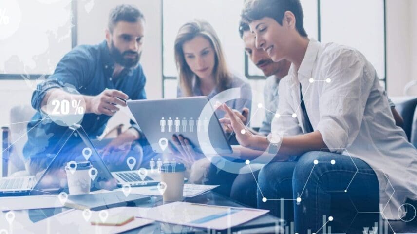 Concept of digital diagram,graph interfaces,virtual screen,connections icon on blurred background.Coworking team at business meeting.Group of colleagues working with startup project in modern office
