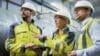 Digital Transformation in Manufacturing, Workers using technology in manufacturing plant