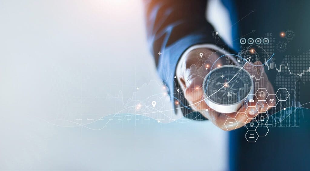 Businessman holding a navigation compass in hand and define marketing direction and analysis growth sale data with search customer global network, Abstract business. to communicate navigating digital transformation