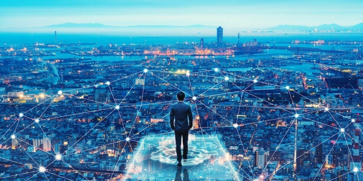 Business man on future network city, to represent the concept of digital transformation