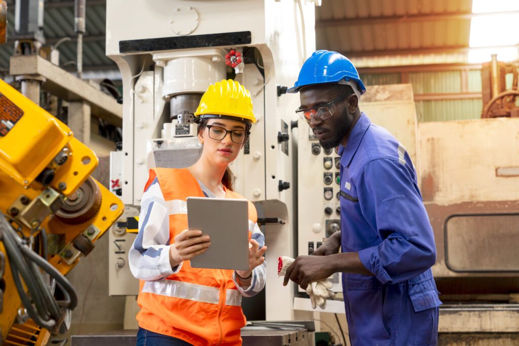 Manufacturing workers using ERP