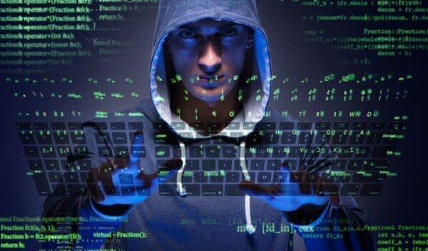 Young hacker in enterprise cyber security concept. Illustrate how to avoid enterprise cybersecurity threats.